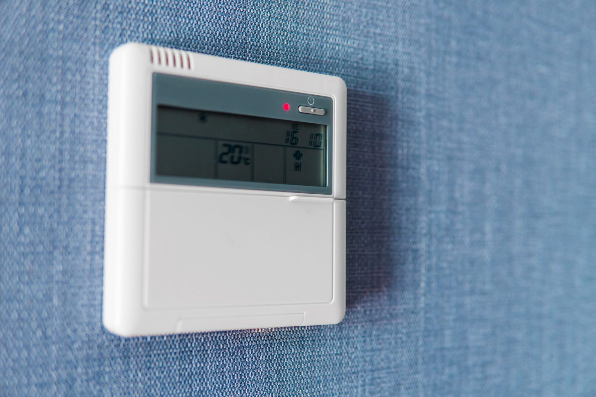 Closeup of wall-mounted thermostat illustrates blog "My AC Thermostat Is Not Getting Power: What To Do?"