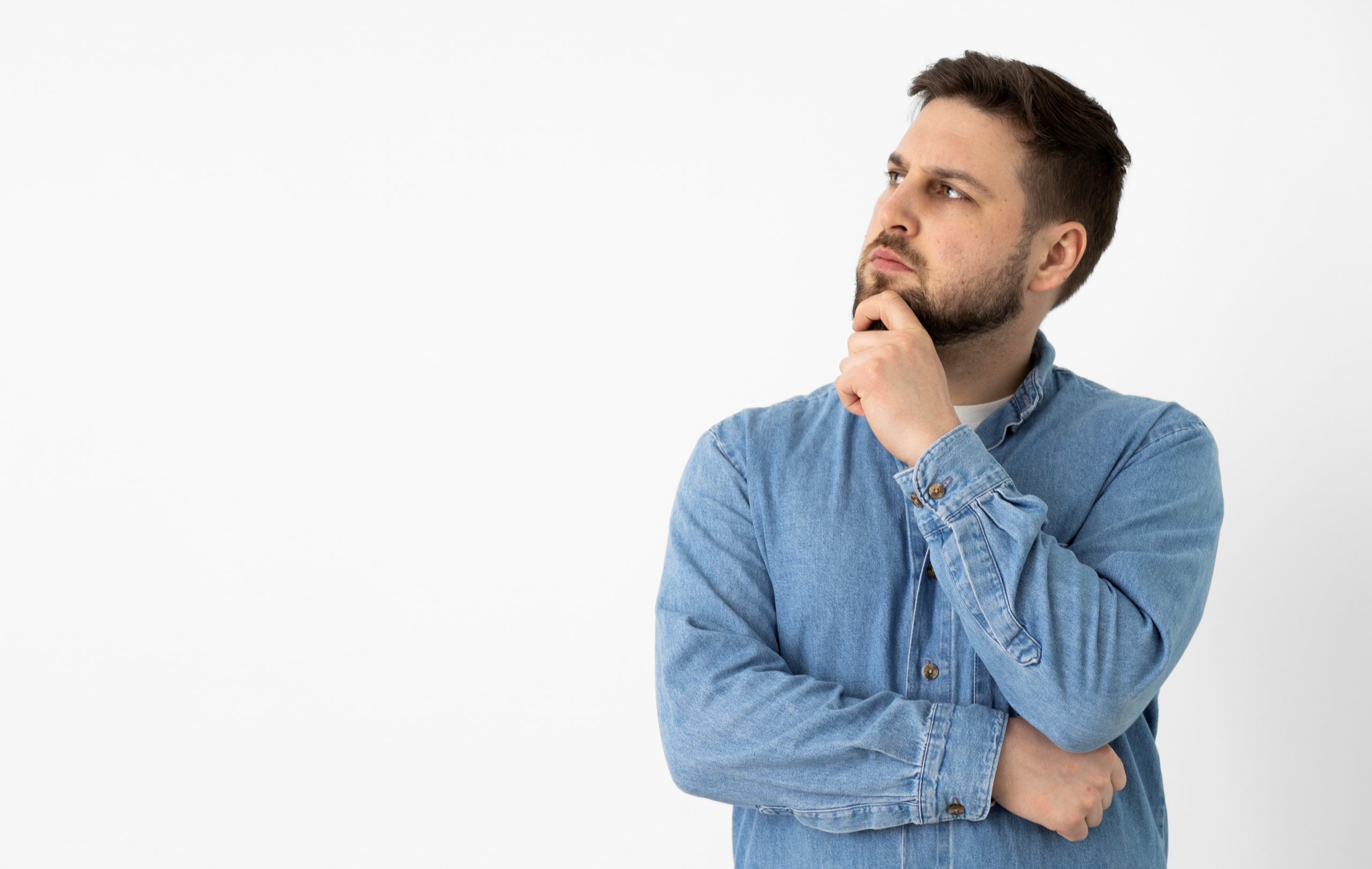 wondering-2-FP Man with hand on chin illustrates blog "Why Is My AC Filter Wet?"