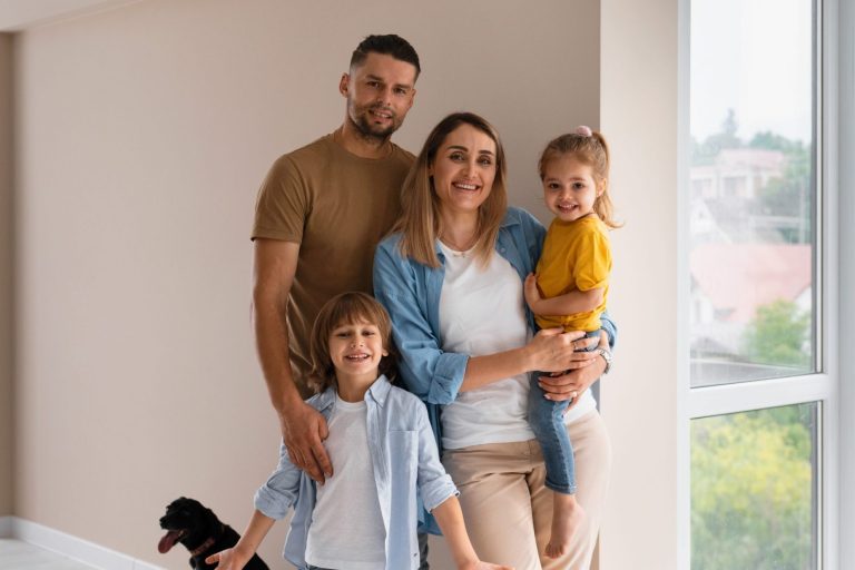 Family of four with dog illustrates blog "What Does an AC Condenser Coil Do?"