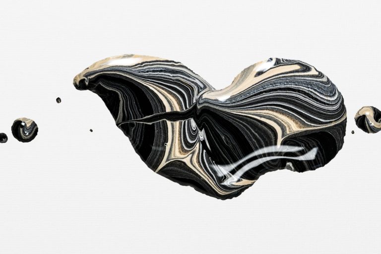 Drop of mercury illustrates blog "Does My Thermostat Have Mercury?"